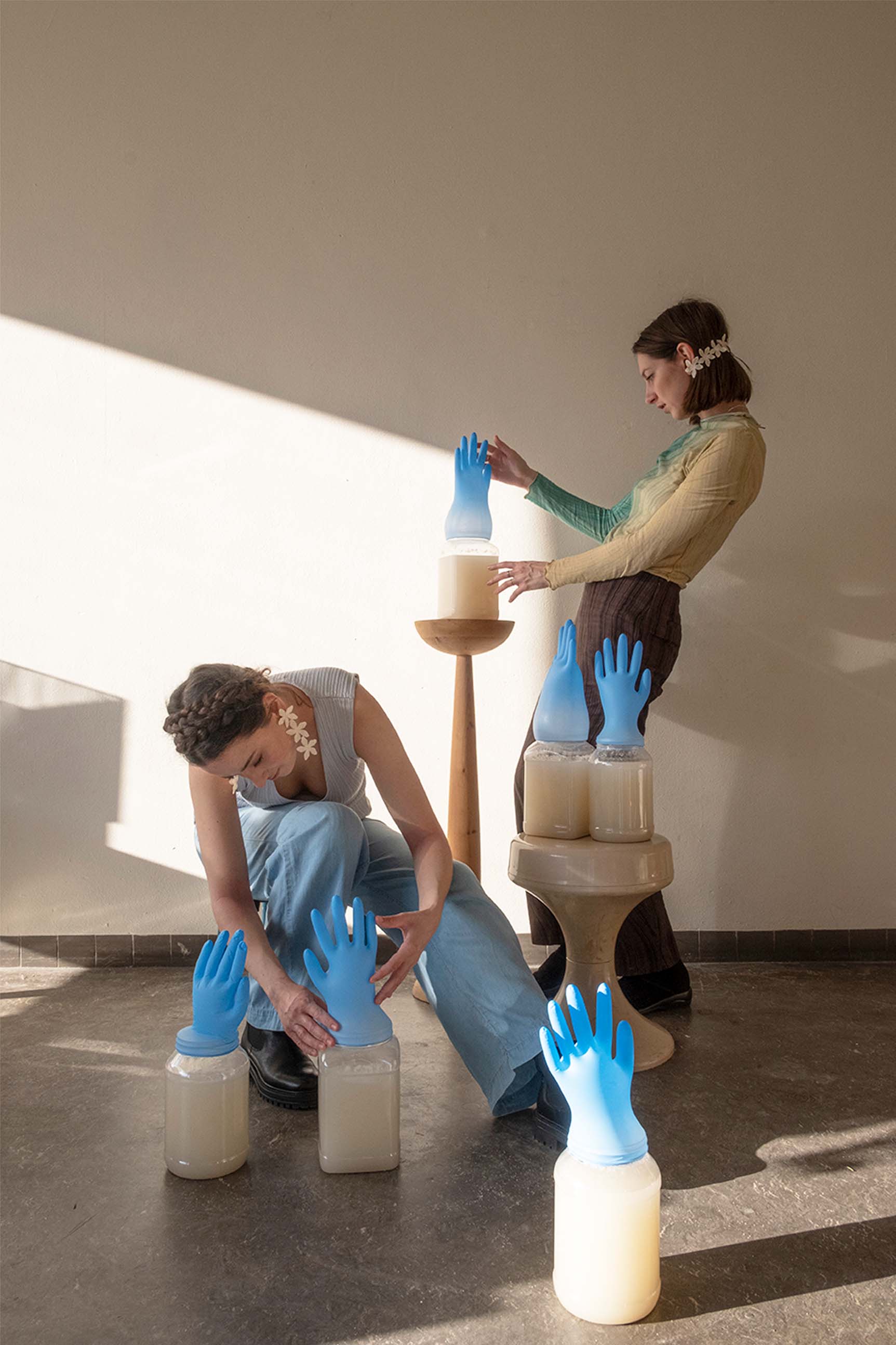 Iskra and Ekaterina holding jars